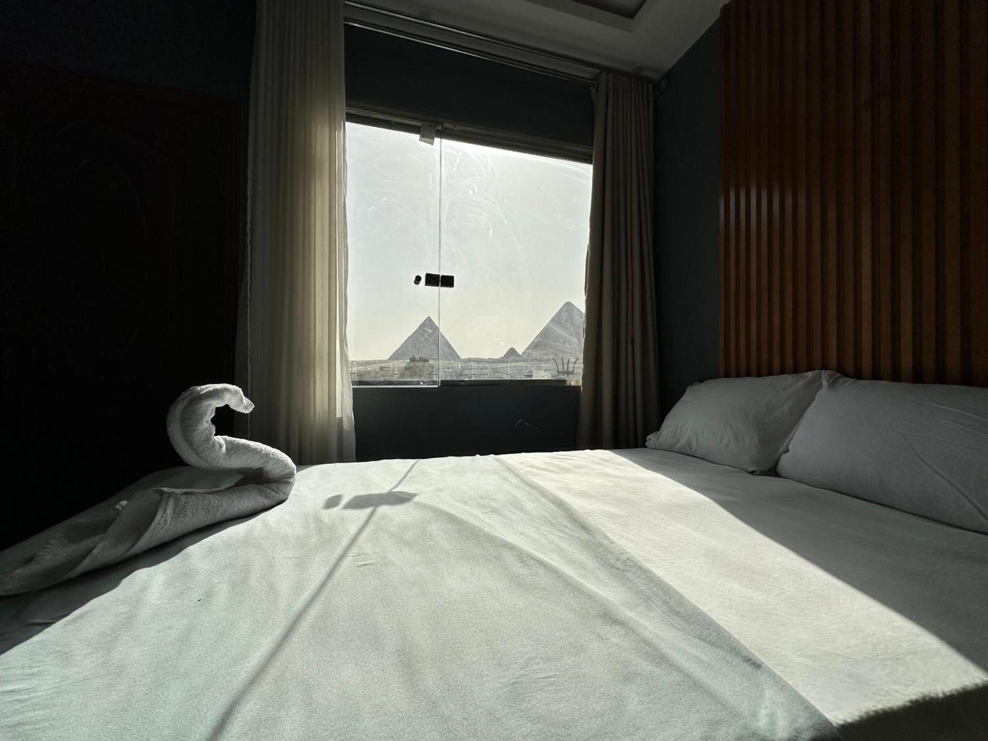 Pyramids Family Inn Kafrat al Jabal Bagian luar foto